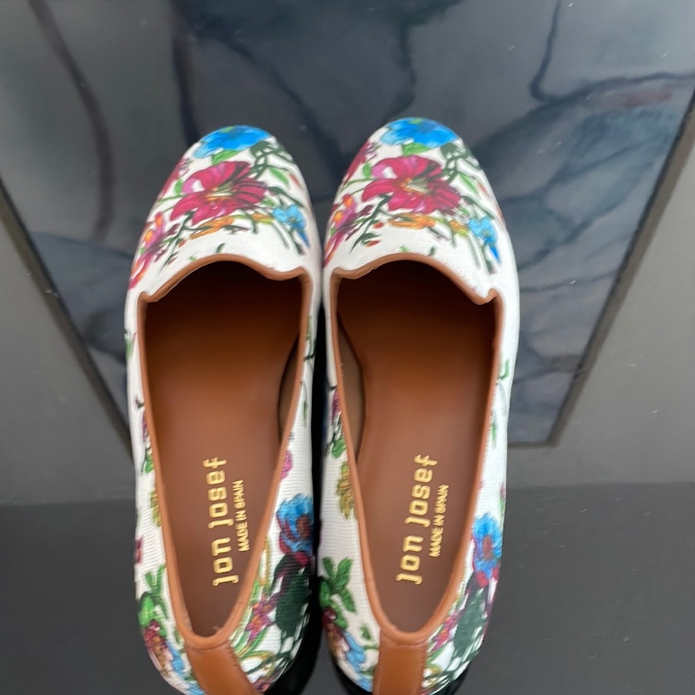 These are new white with flowers . Made by Jon Josef . From Spain  size 7